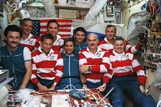 STS-79 and Mir-22 crew in-flight portrait 